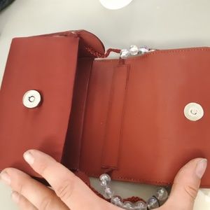 Used wine color purse